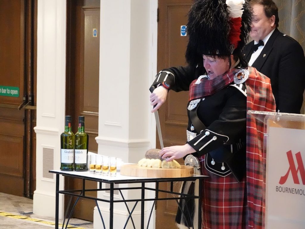Piper delivering the Address to a Haggis at a Burns Supper
